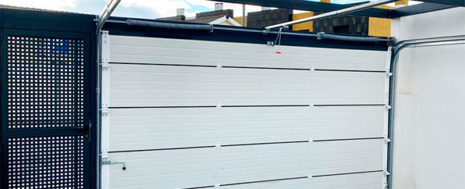 ¿Cómo funciona el montaje de puertas seccionales? - ¿Cómo funciona el montaje de puertas seccionales?