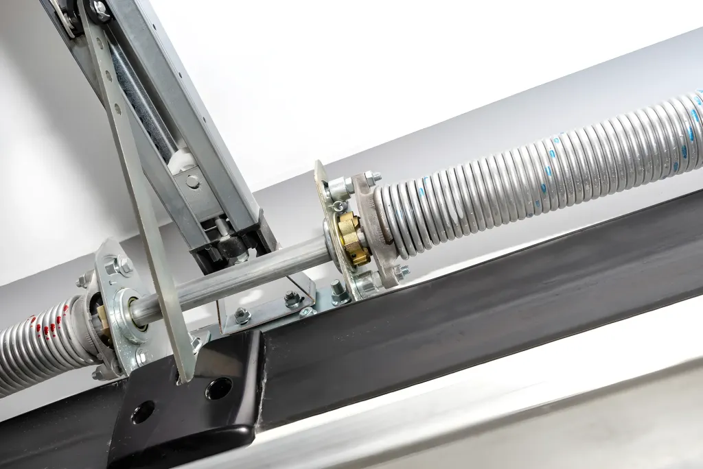 Cómo sustituir un muelle de torsión de una puerta de garaje - sustitucion muelle torsion puerta garaje 2 Sustitución de muelles de torsión en puertas seccionales