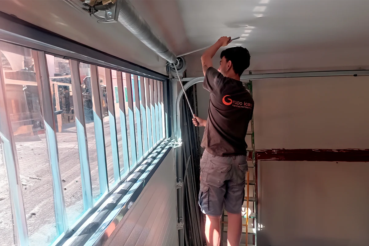 sustitución-muelle-torsion-puerta-garaje-d Cómo sustituir un muelle de torsión de una puerta de garaje