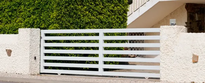Cómo cambiar las ruedas de una puerta de garaje corredera - Cómo cambiar las ruedas de una puerta de garaje corredera